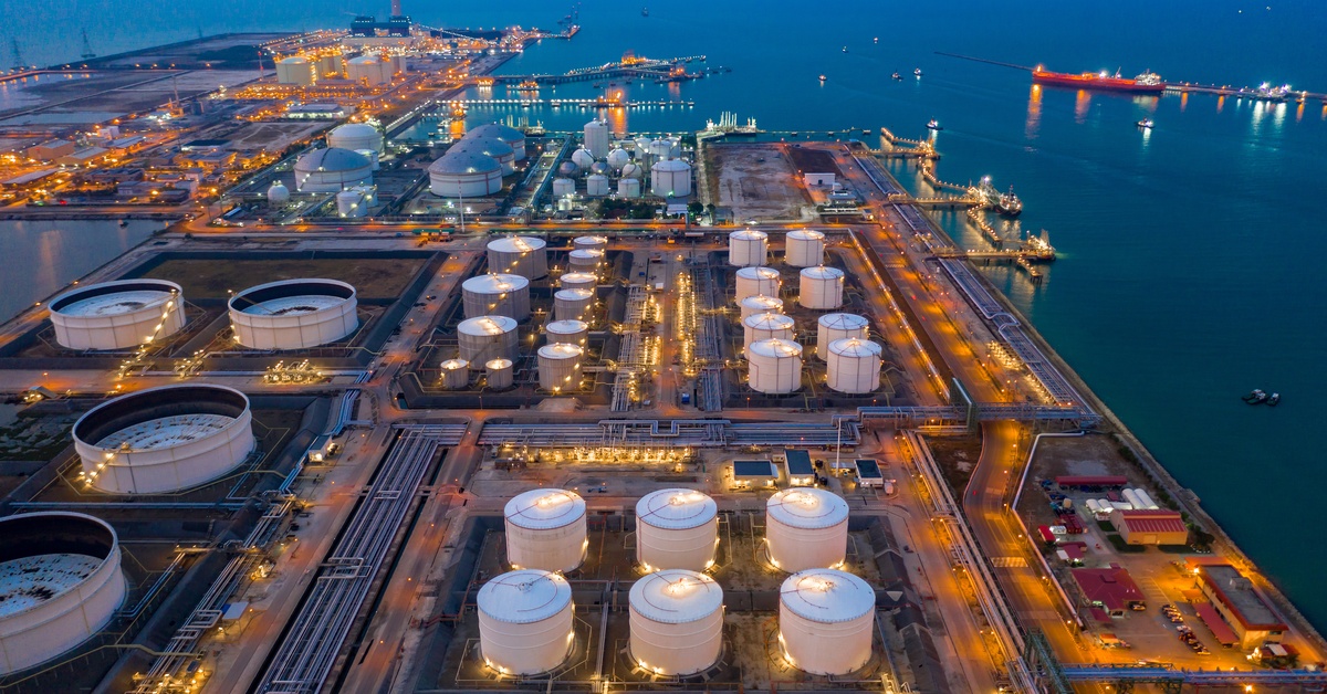 An aerial view of an oil and gas terminal, storage tank farm, and storage of chemical, petroleum, petrochemical refinery products.